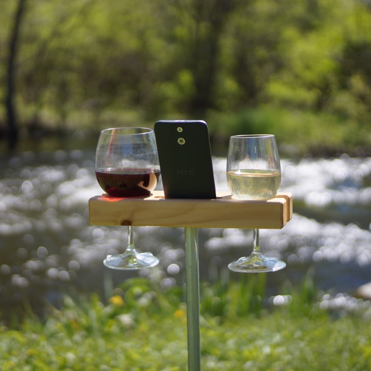 Hold your glass of wine outdoors while also holding your smartphone. Speaker built in for backyard entertainment.